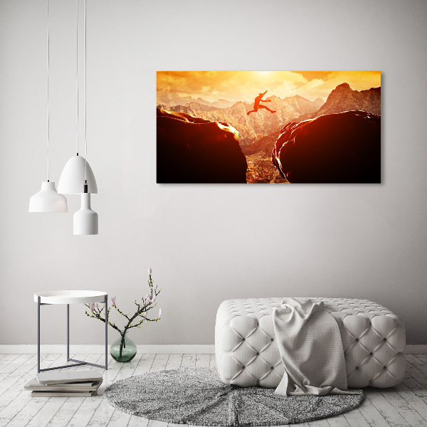 Canvas foto Spring over de afgrond