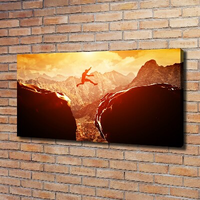 Canvas foto Spring over de afgrond