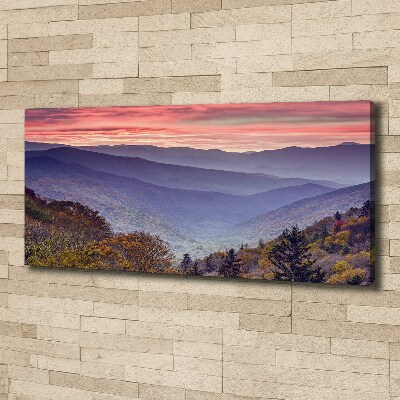 Schilderij op canvas Zonsondergang boven de bergen