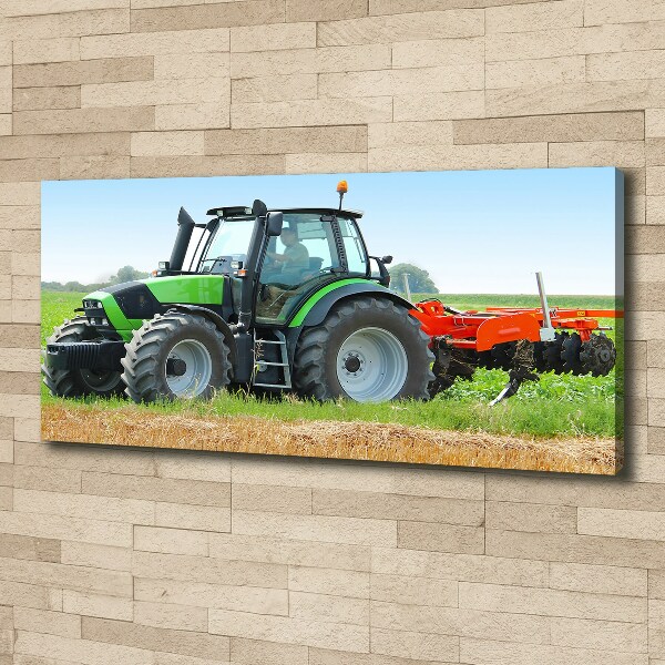 Canvas foto Tractor op het veld