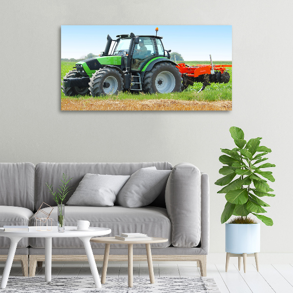 Canvas foto Tractor op het veld