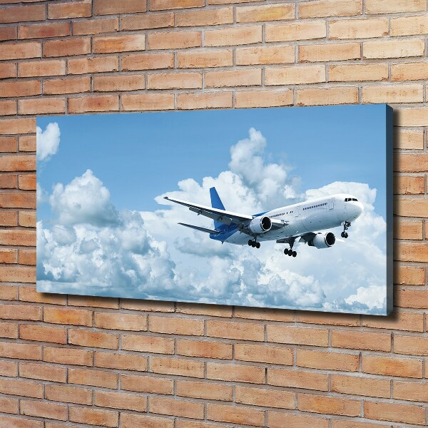 Canvas schilderij Een vliegtuig in de lucht