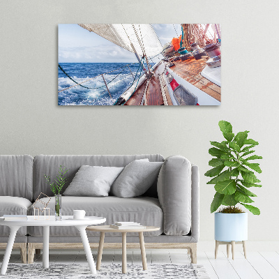 Canvas foto Een zeilboot op zee