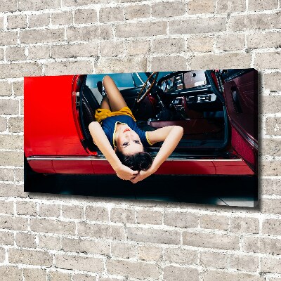 Foto canvas Vrouw in de auto