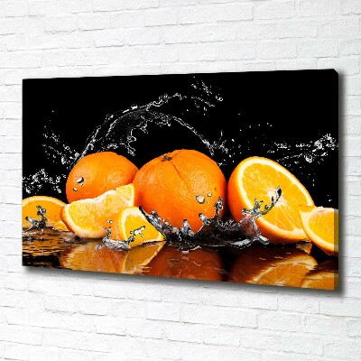 Foto canvas Sinaasappels en water