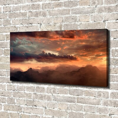 Canvas schilderij Zonsondergang boven de bergen