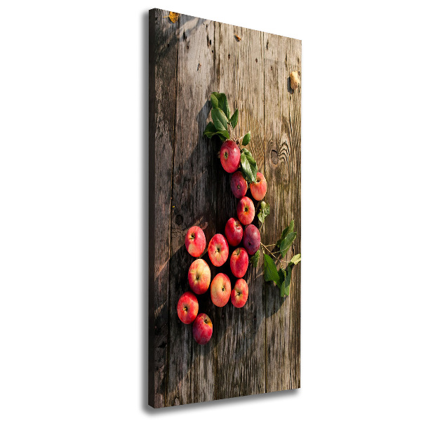 Verticaal schilderij op canvas Appels op tafel