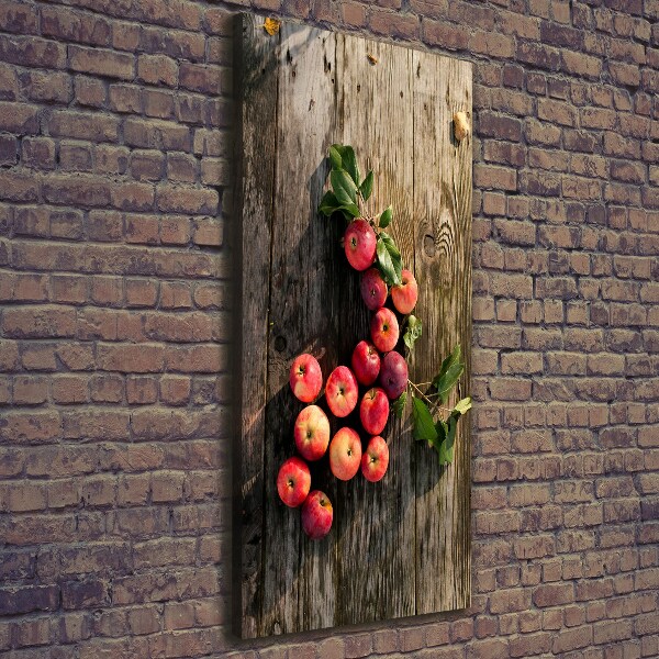 Verticaal schilderij op canvas Appels op tafel