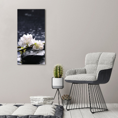 Verticaal schilderij op canvas Bloemen en stenen
