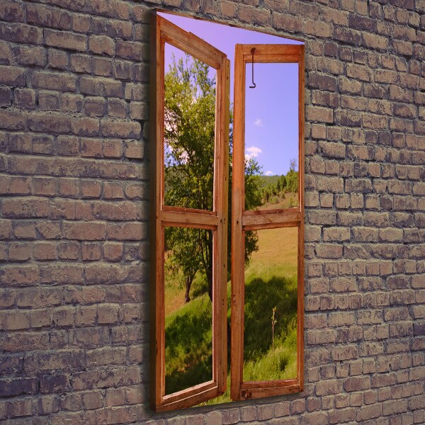 Verticaal schilderij op canvas Het landschap buiten het raam.