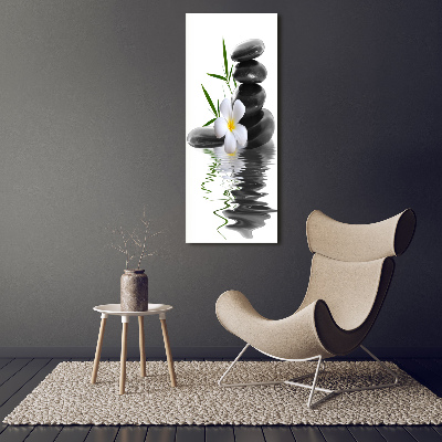 Verticaal canvasschilderij Orchidee en stenen