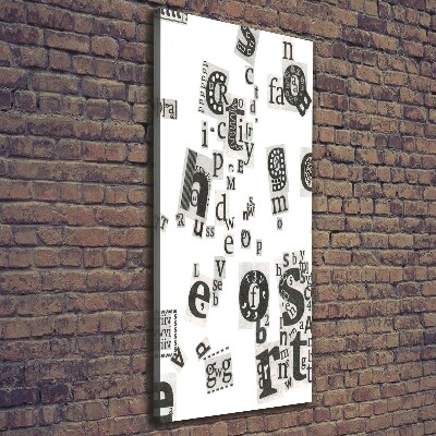 Verticale canvasfoto Brieven uit een krant