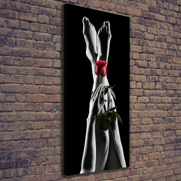 Verticaal schilderij op canvas Roos en voeten