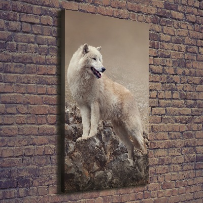 Verticaal schilderij op canvas Wolf op een rots