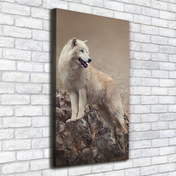 Verticaal schilderij op canvas Wolf op een rots