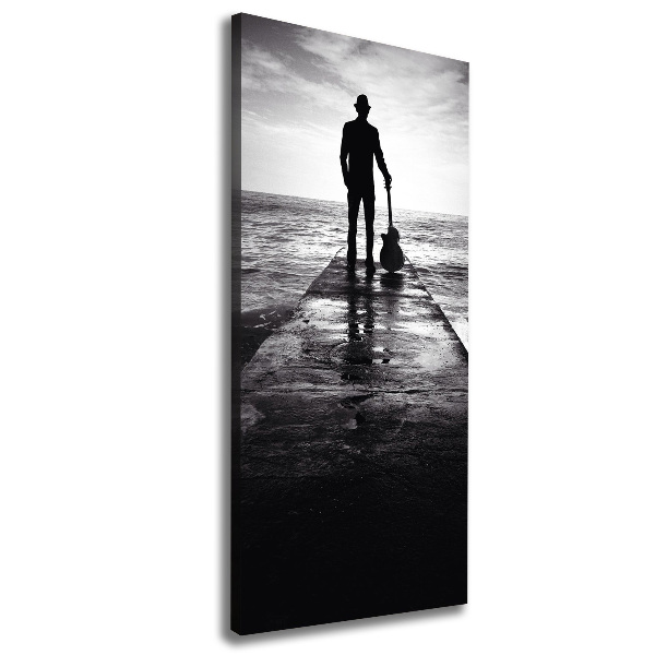Verticaal schilderij op canvas Gitarist op de pier