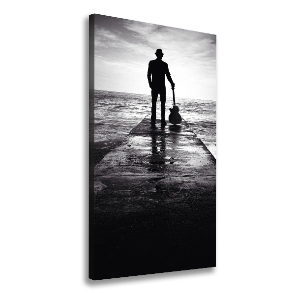 Verticaal schilderij op canvas Gitarist op de pier
