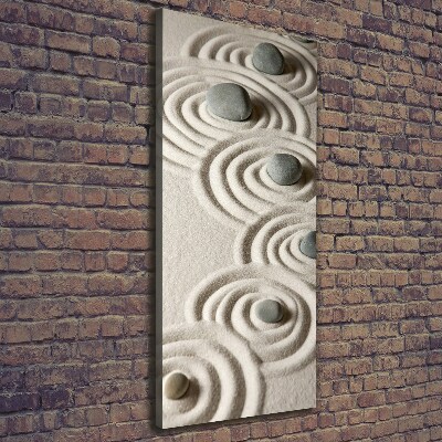 Verticaal canvasschilderij Stenen in het zand