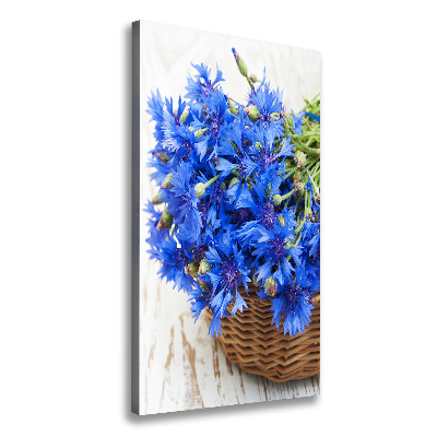 Verticale foto op canvas Korenbloemen in een mand