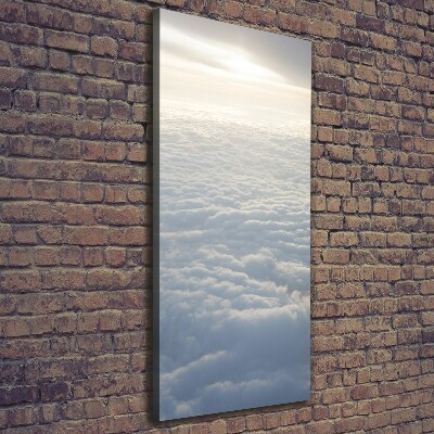 Verticaal schilderij op canvas Vliegen boven de wolken