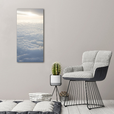 Verticaal schilderij op canvas Vliegen boven de wolken