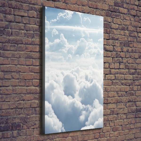 Verticale foto op canvas Vliegen boven de wolken