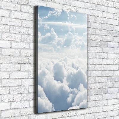 Verticale foto op canvas Vliegen boven de wolken