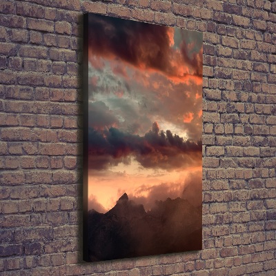 Verticaal schilderij op canvas Zonsondergang boven de bergen