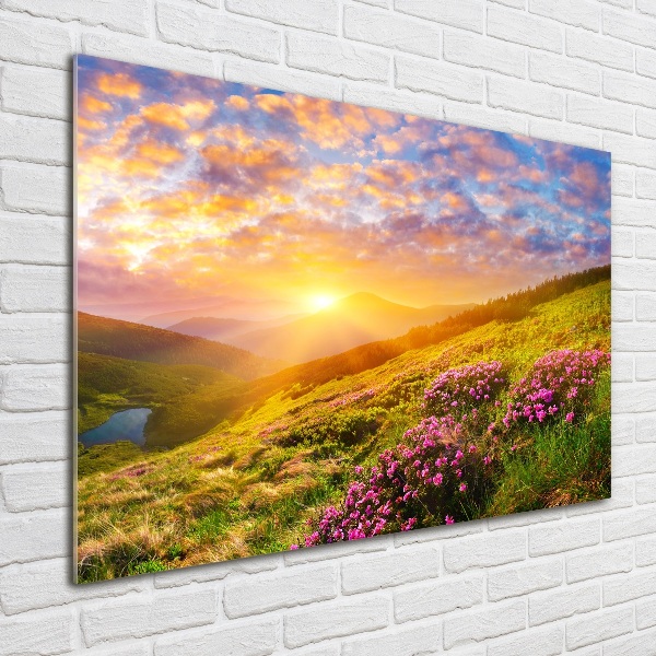 Schilderij glas Zonsondergang boven de bergen