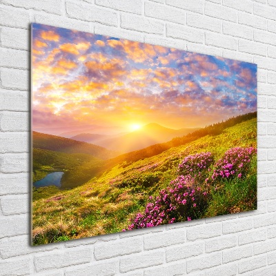 Schilderij glas Zonsondergang boven de bergen
