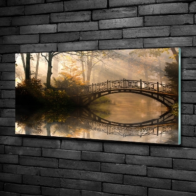 Schilderij op glas Oude brug in de herfst