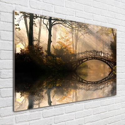 Schilderij op glas Oude brug in de herfst