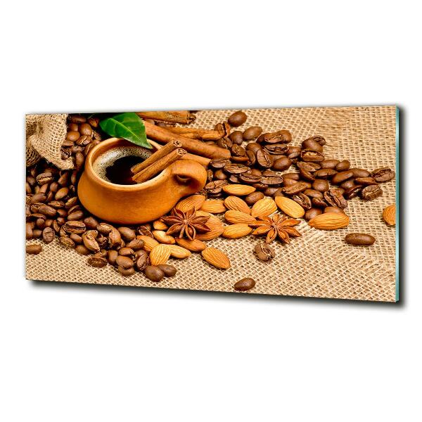 Foto schilderij op glas Koffiebonen en een kopje