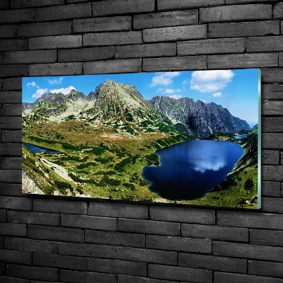 Schilderij op glas Een vallei in de bergen