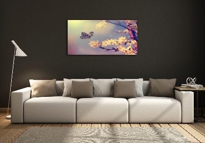 Schilderij op glas Kersenbloesem en vlinder