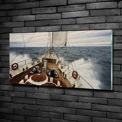Schilderij op glas Een zeilboot op zee