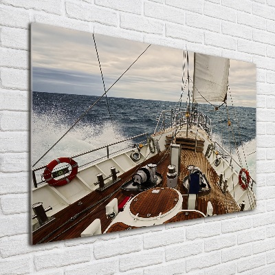 Schilderij op glas Een zeilboot op zee