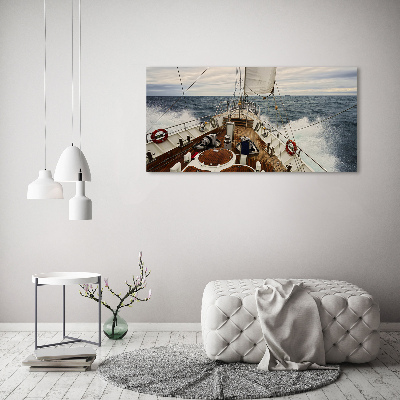 Schilderij op glas Een zeilboot op zee