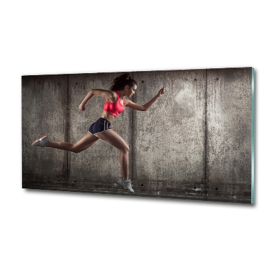 Foto schilderij op glas Rennende vrouw