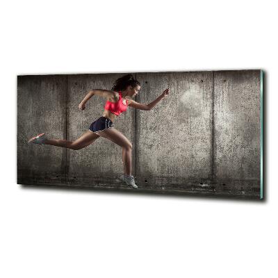 Foto schilderij op glas Rennende vrouw