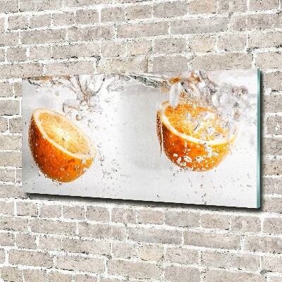 Foto schilderij op glas Sinaasappels onder water