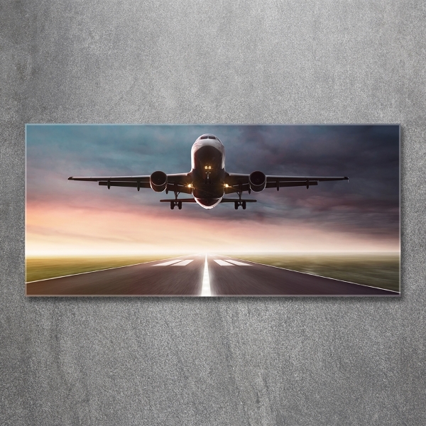 Glazen schilderij Een vliegtuig dat opstijgt