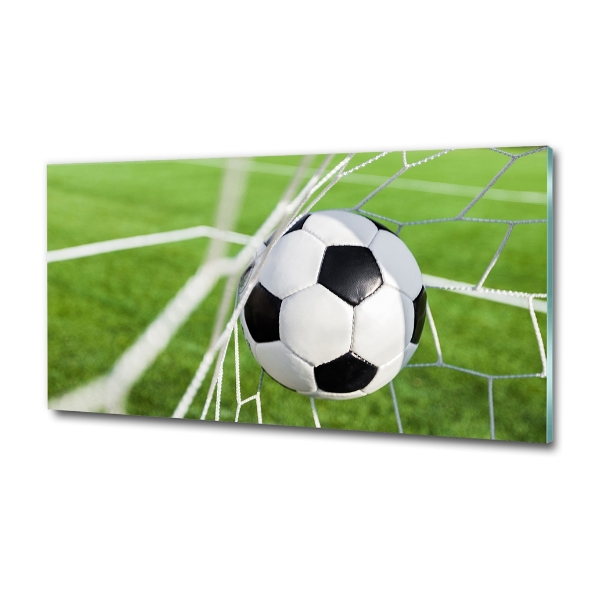Foto schilderij op glas De bal ligt in het doel.