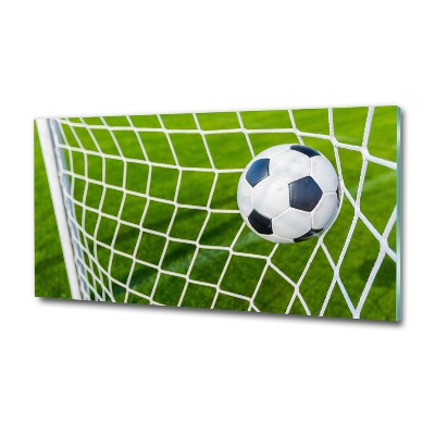 Schilderij glas De bal ligt in het doel.