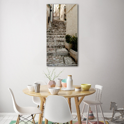 Verticale foto op glas Een charmante straat