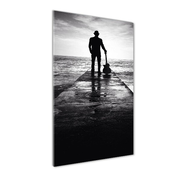 Verticale foto op glas Gitarist op de pier