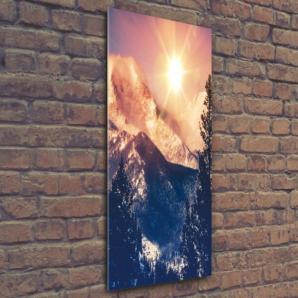 Verticale glasfoto De zon boven de bergen