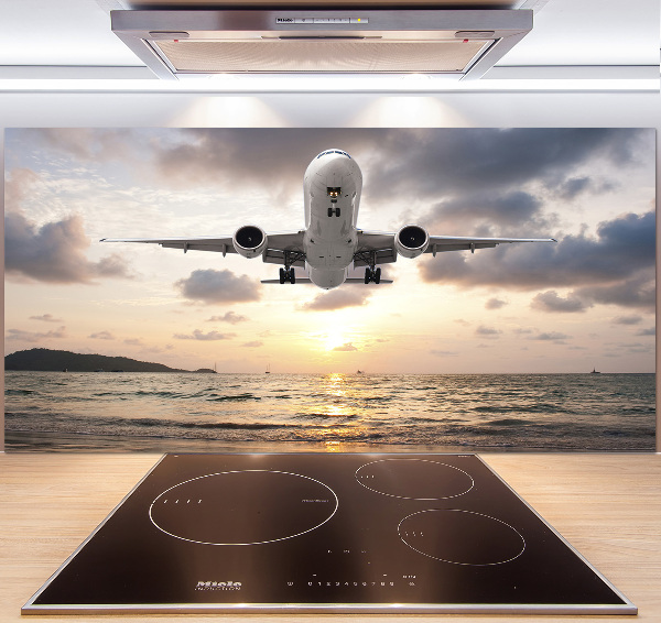 Keuken achterwand Een vliegtuig boven de zee