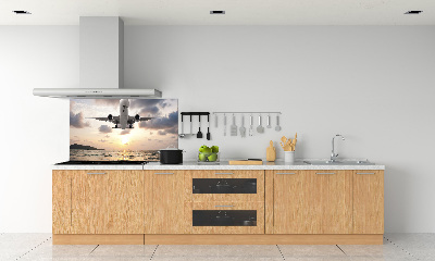 Keuken achterwand Een vliegtuig boven de zee