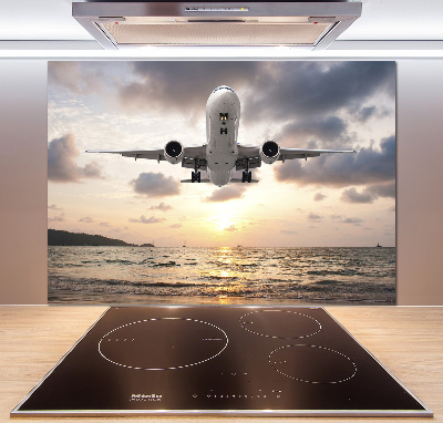 Keuken achterwand Een vliegtuig boven de zee
